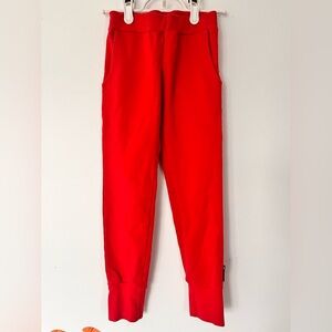 Ommillenen Finland brand. Vibrant Red Kids neutral gender organic Jogger Pants
